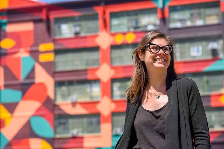 Artist Amy Wilson, 46, poses outside of her Jersey City, N.J., studio on June 17, 2020.