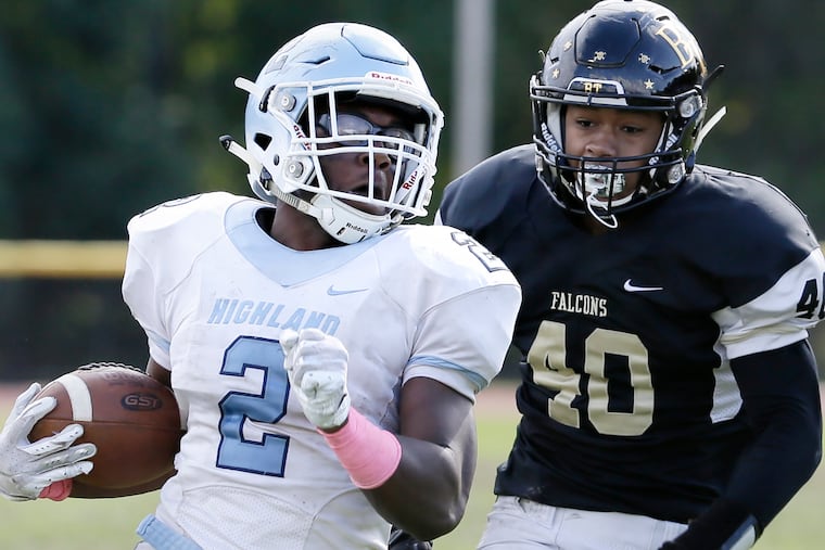 Highland's Johnny Martin (No. 2) ran for 2,0002 yards and 19 touchdowns as a sophomore.