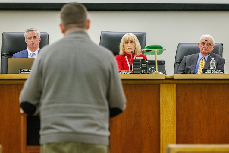 Rev. Kevin Jagoe with BuxMont Unitarian Universalist Fellowship shares his opposition to ICE turning warehouses into detention sites as he speaks to the Bucks County Commissioners Wednesday.