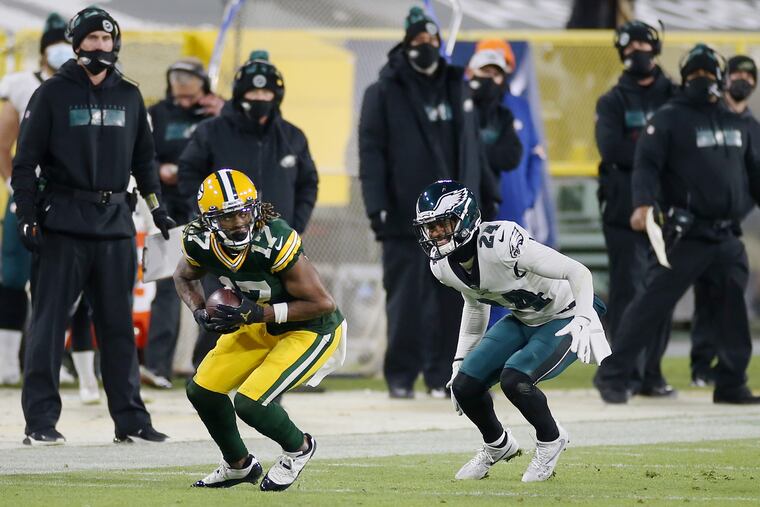 Green Bay Packers wide receiver Davante Adams (17) makes a catch in front of Eagles cornerback Darius Slay.