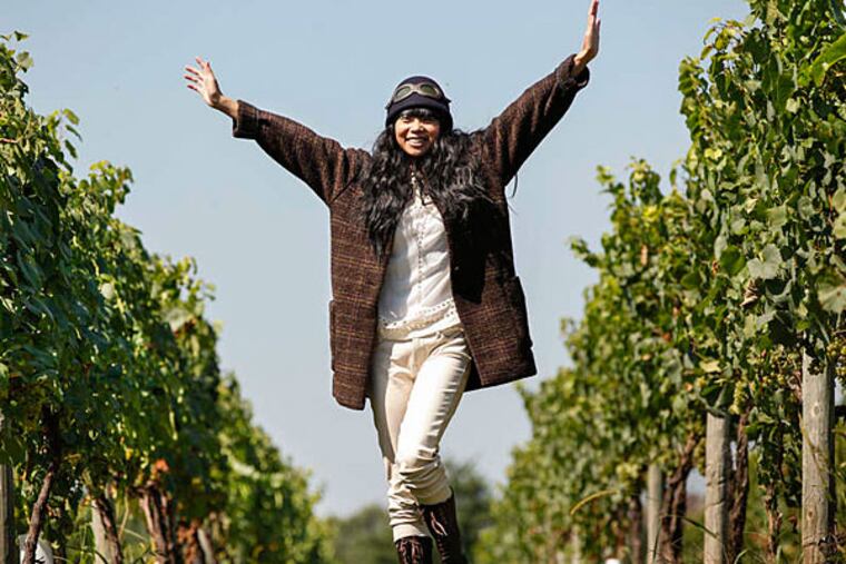 Plaid cocoon coat , Isabel Marant, $498; embroidered top, Isabel Marant, $448; cream suede pant, Mother, $176, all at Eaves; equestrian hat, Grace, $68, at Joan Shepp; chocolate brown lace-up boots, Timberland, $240, at Timberland. (Staff photographs by Michael S. Wirtz)