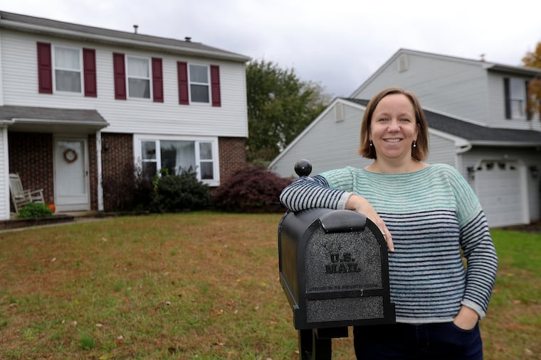 Katie Bailey poses outside her home in Horsham, PA.