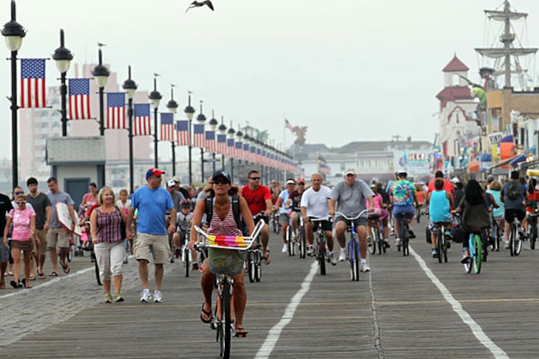 Pedestrians and bike riders enjoy the Ocean City Boardwalk. Ocean City also won the crown in 2009. (Yong Kim/Staff/File)
