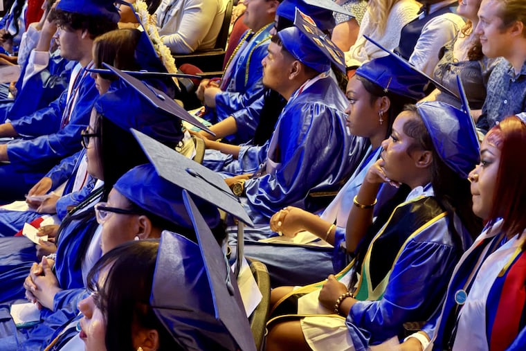 Olney High Class of 2026 graduates listen to speakers Tuesday at their graduation ceremony at the Met on North Broad Street.