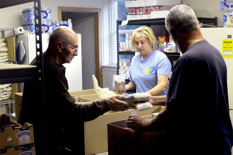 Volunteers (from left) Tony DiFebbo of Lindenwold, Pat Cafone of Voorhees, Tony Balaguer of Lindenwold.