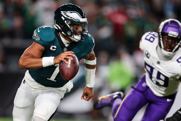 Eagles quarterback Jalen Hurts, pictured in a 2023 game vs. Minnesota, will look to get the offense back on track Sunday against the Vikings.