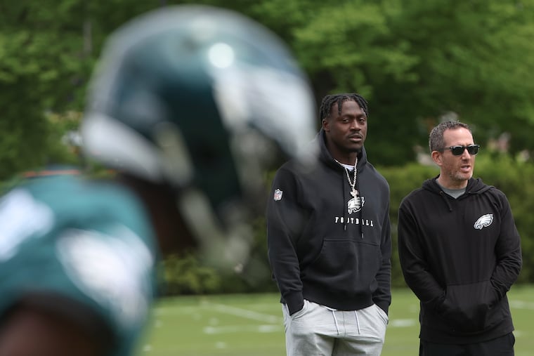 Eagles general manager Howie Roseman (right) obtained A.J. Brown in a shrewd deal four years ago. Would he be comfortable with a wide receiver corps that didn't have Brown in it?