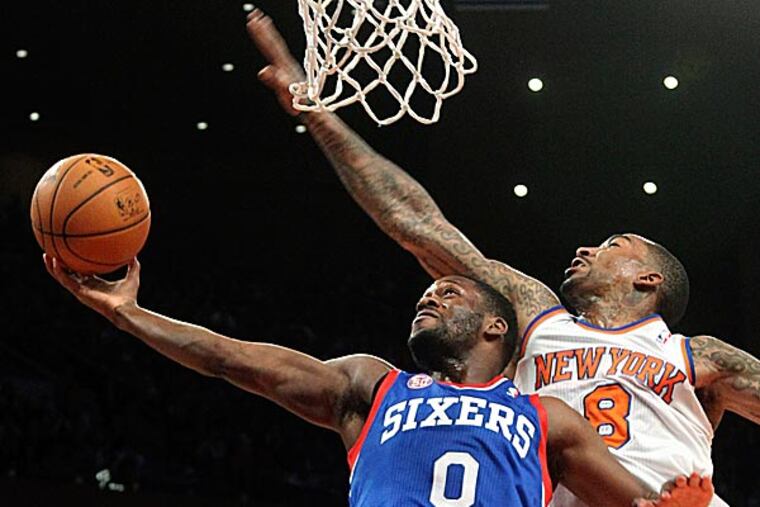 The 76ers' Jeremy Pargo shoots past Knicks' J.R. Smith during the second half. (Mary Altaffer/AP)