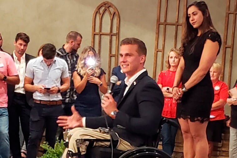 In this photo provided by Cawthorn campaign staffer Patrick Sebastian, Madison Cawthorn speaks to supporters, Tuesday in Hendersonville, N.C.