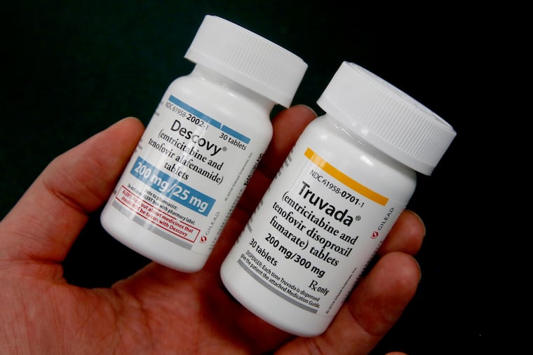 Pharmacist Clint Hopkins displays the HIV prevention drugs Descovy, left and Truvada, right, at Pucci's Pharmacy in Sacramento, Calif., Monday, Oct. 7, 2019. Gov. Gavin Newsom signed a bill, SB159, by state Sen. Scott Wiener, D-San Francisco, Monday, authorizing pharmacists to sell the HIV preventative medications, to patients without a physician's prescription. (AP Photo/Rich Pedroncelli)