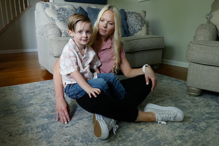 Allison Welsh with her 6-year-old son, Levi, in their home in Washington Township. Welsh was horrified when she saw a video of her son crying in his Wedgwood Elementary School kindergarten classroom that was posted online by his special education teacher.
