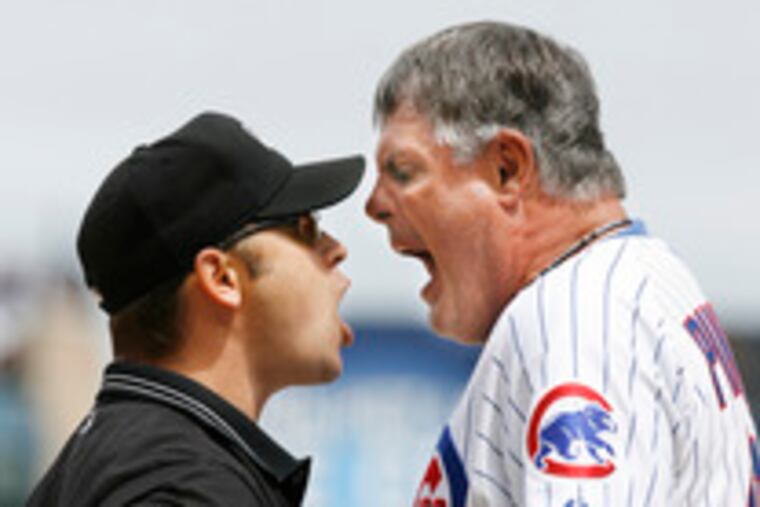 Cubs manager Lou Piniella gets in the face of third-base umpire Mark Wegner during a loss on June 2. Piniella was tossed, but his tirade woke up the team, which has gone 29-14 since then.