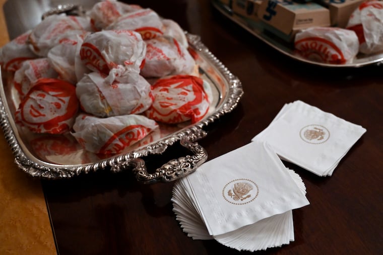 Fast-food sandwiches sit on platters in the State Dining Room of the White House in Washington for a reception for the Clemson Tigers college football team in January 2019.