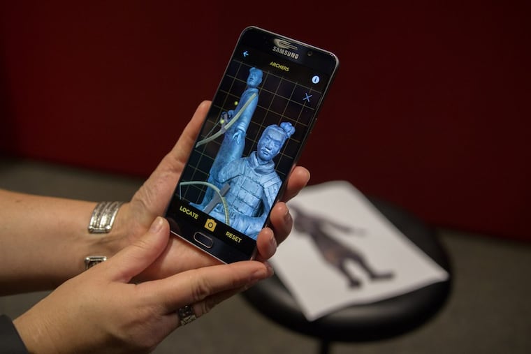 Visitors to the Terraracotta Warriors exhibit can point their smartphone cameras at the figures to add missing details like a bow that they wielded, 2200 years ago.