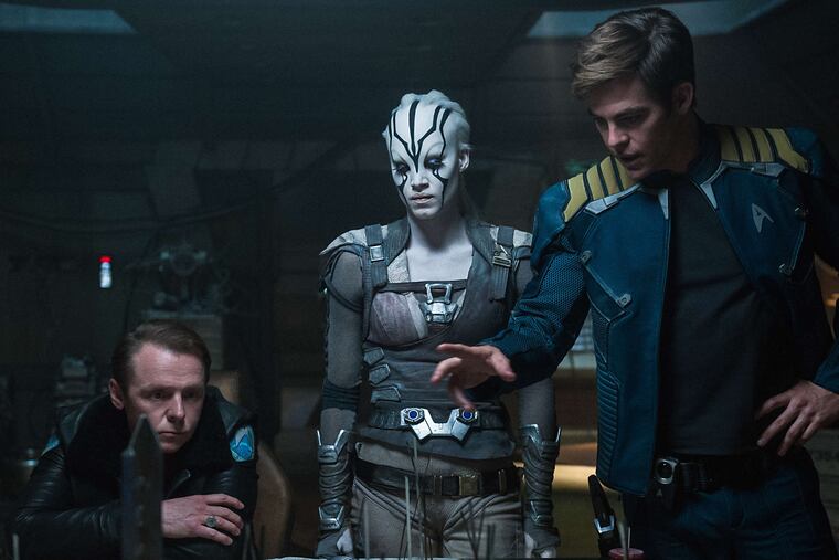 Simon Pegg (left) as Lt. Cmdr. Montgomery "Scotty" Scott, Sofia Boutella as Jaylah, and Chris Pine as Capt. James T. Kirk in "Star Trek Beyond," the third installment in J.J. Abrams' reboot of the franchise.