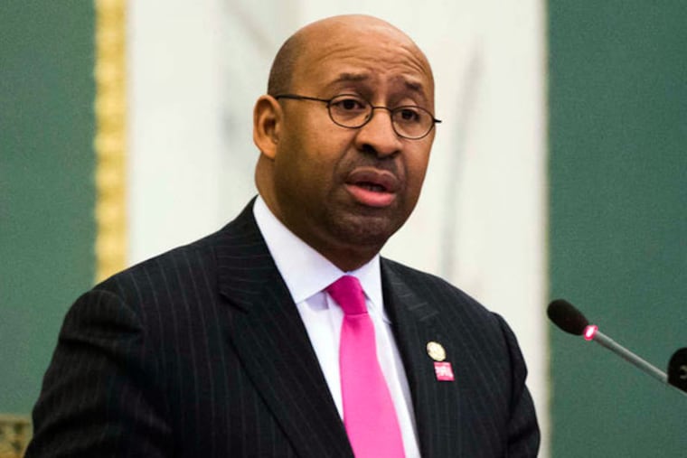 Mayor Nutter applauded the Board of Ethics and the City Council for addressing the problem of 'hidden' campaign financiers. (MATT ROURKE/Associated Press)