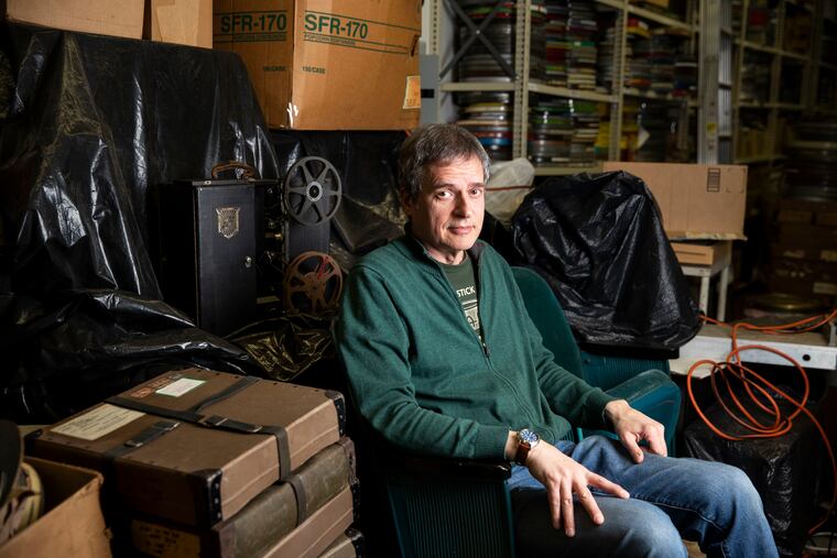 Jay Schwartz posed for a portrait at the Secret Cinema Workshop/Warehouse in Philadelphia, Pa. on Tuesday, March 8, 2022. March 2022 will mark the 30th anniversary of the Secret Cinema. On March 15, the Secret Cinema will return to the Bryn Mawr Film Institute.
