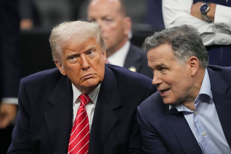 President Donald Trump and U.S. Sen. Dave McCormick (R., Pa.) attend the finals at the NCAA wrestling championship in Philadelphia in March.