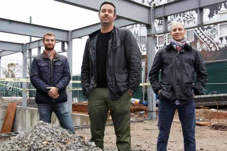 MM Partners developers (from left) Aaron Smith, David Waxman, and Jacob Roller at the site of their Braverman Building site on W. Girard Ave.