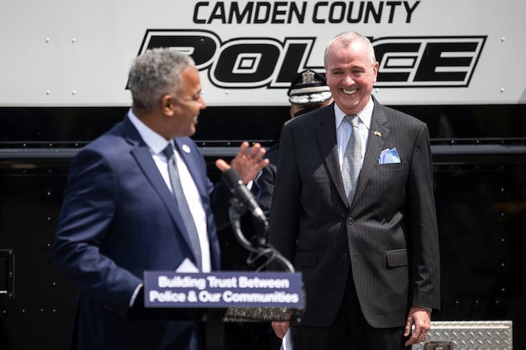Mayor Victor Carstarphen with Gov. Phil Murphy in 2021. Murphy’s administration has approved a Camden bill that lifts a cap on the amount of taxpayer money that can be allocated toward current and former officials’ legal defense.
