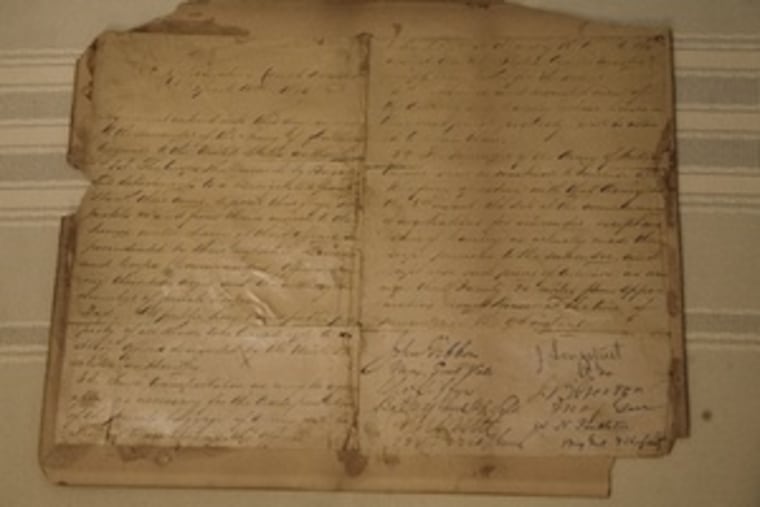 The document , varnished and glued to cardboard, lists the terms of Gen. Robert E. Lee's surrender.