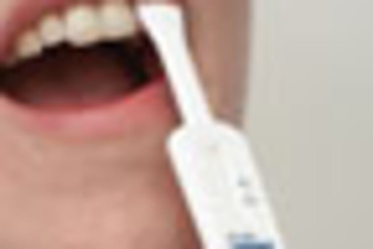 (he1test15) The OraQuick ADVANCE Rapid HIV-1/2 test screens for antibodies to HIV using a swab of the gums. The pad is then inserted into a vial of fluid for 20 minutes. The appearance of one horizontal line (C, for control) indicates that the test is responding normally. A second horizontal line (T, for test) means antibodies have been detected. A preliminary HIV positive result, shown here, must be confirmed by a laboratory blood test. The oral test, made by OraSure Technologies Inc. of Bethlehem, Pa., of has been used in clinics and test centers since 2004. On May 15, 2012, a Food and Drug Administration advisory committee will consider over-the-counter sale of the same test for consumers to use at home.
CREDIT: OraSure Technologies Inc.