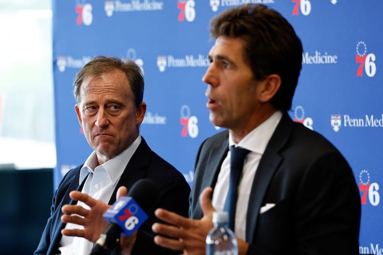 Bob Myers (right) talks as Josh Harris looks on during their news conference last week following the firing of Daryl Morey.