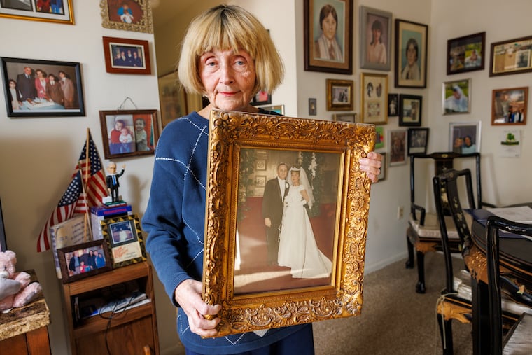 Marlyn Harris widow of Herbert Harris, husband 58 years, wedding portrait, April 1965. She is struggling to get his grave stone completed after paying for it. Photograph taken at her home in northeast Philadelphia, Friday, Jan. 10, 2025.