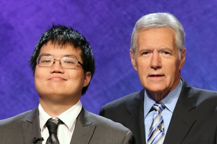 Swarthmore grad Arthur Chu, shown with "Jeopardy!" host Alex Trebek, won a Tournament of Champions game on Nov. 11, 2014, qualifying for the semifinals.