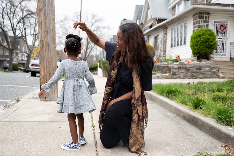 Osarhia Ferguson with her daughter Aila, 2.