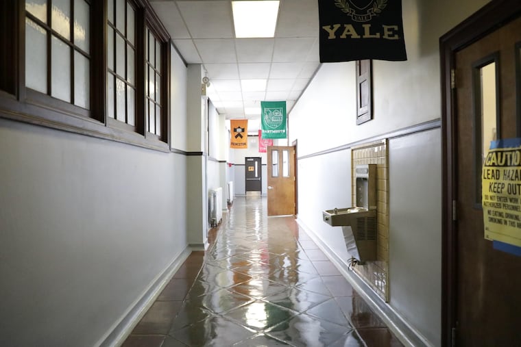A hallway at Nebinger Elementary at Sixth and Carpenter in South Philadelphia, where kindergarten seats promised to existing Nebinger families are being given away to students from neighboring Meredith Elementary, a wealthier school.