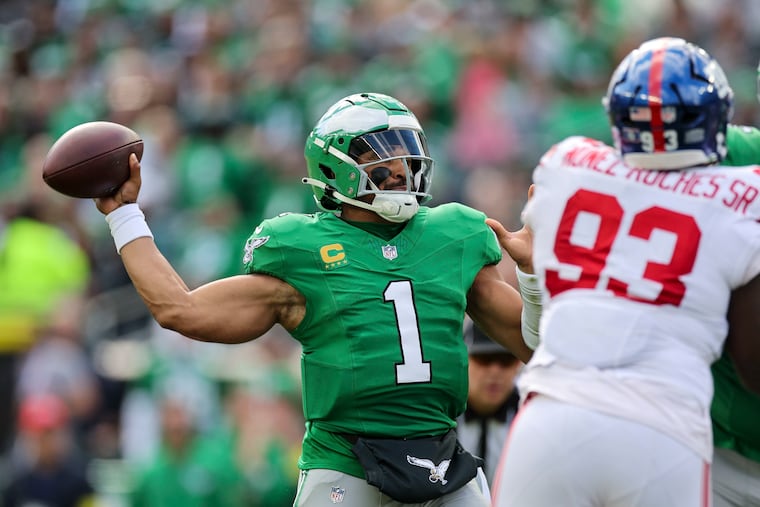 Eagles quarterback Jalen Hurts passed for 179 yards and four touchdowns in the rout of the Giants at Lincoln Financial Field.
