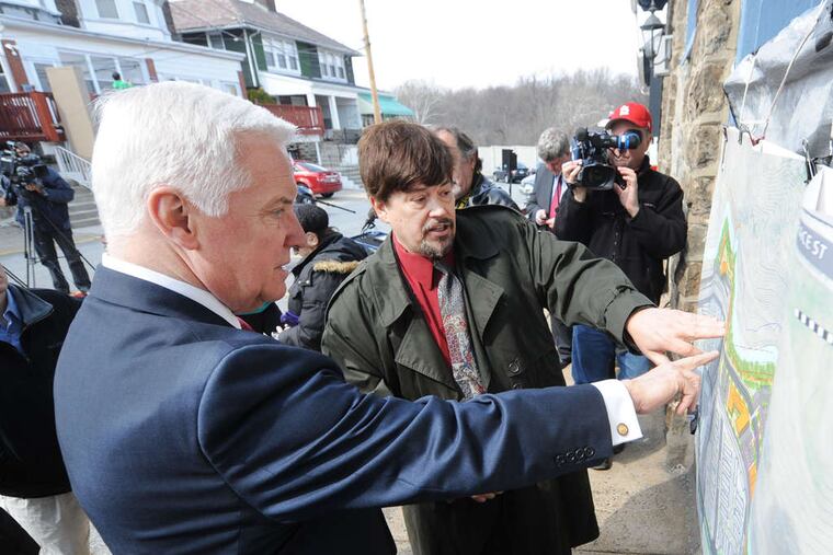 Millbourne Mayor Thomas Kramer (center) welcomes Gov. Corbett to his tiny Delaware County borough, which the state declared "financially distressed" in 1993.