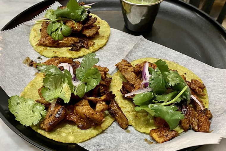 Tacos de trompo, a riff on tacos al pastor, at El Mezcal Cantina, 1260 Point Breeze Ave.