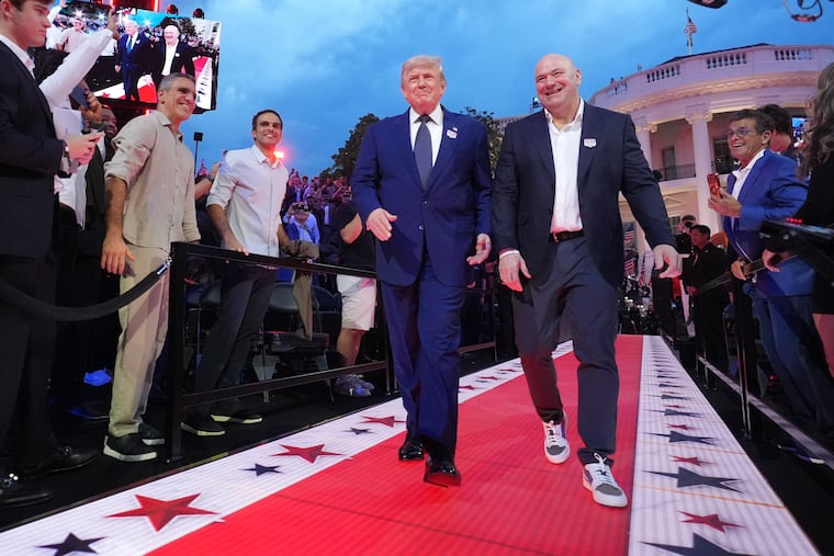President Donald Trump and Dana White, UFC president and CEO, arrive for UFC Freedom 250 on the South Lawn of the White House, Sunday, June 14, 2026, in Washington.
