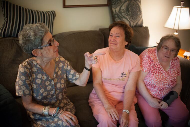 Harriet, 62, Phyllis, 70, and Debby, 50, chat in Harriet’s living room.