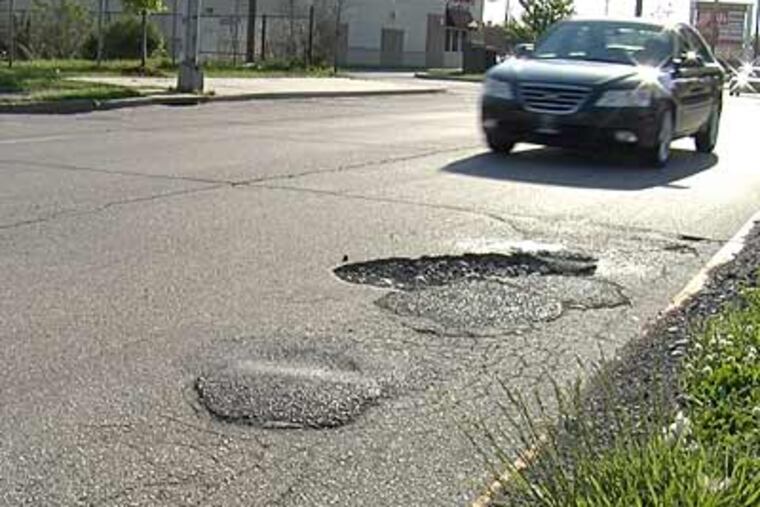 The pothole crop is plentiful this year. (DANIEL SCHWARTZ / For the Daily News)