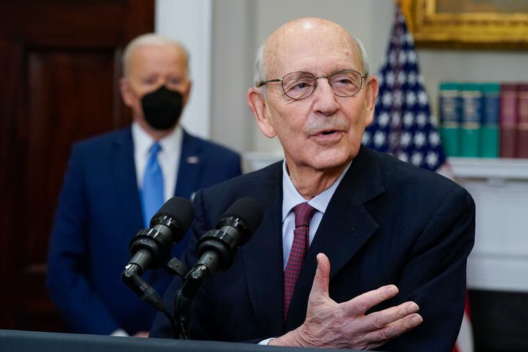 Supreme Court Associate Justice Stephen Breyer announces his retirement in the Roosevelt Room of the White House in Washington. President Joe Biden looks on.
