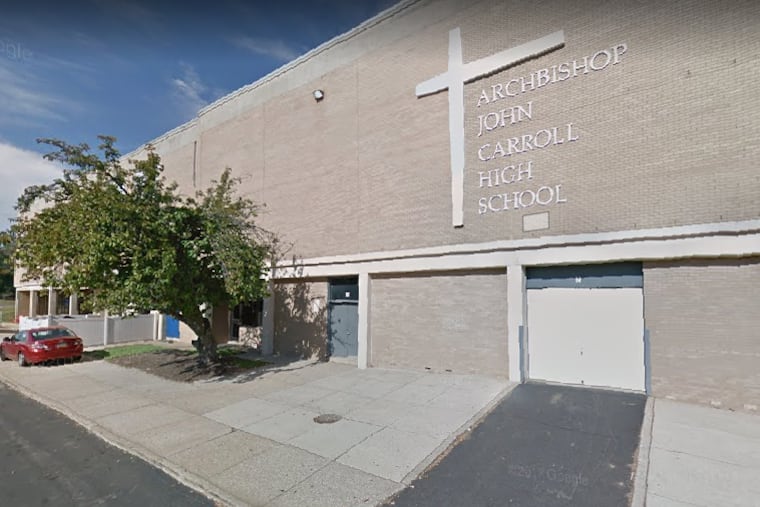 A teacher at Archbishop Carroll High School was charged with having sexual contact with a student.