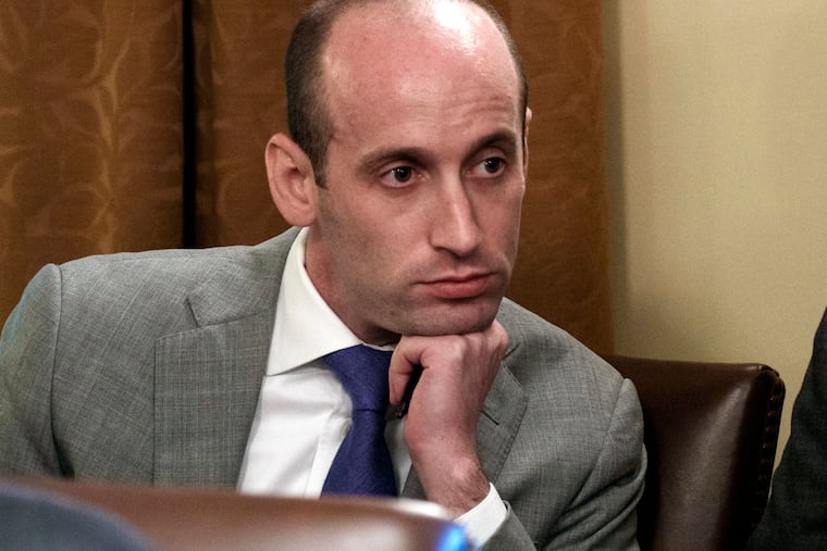 In this June 21, 2018 file photo, White House senior adviser Stephen Miller listens as President Donald Trump speaks during a cabinet meeting at the White House in Washington.
