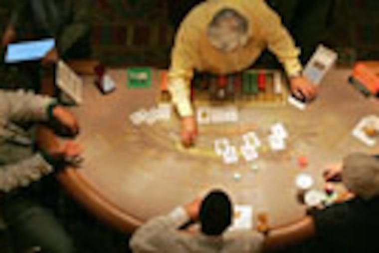 Betting inside of the Tropicana.
( David Swanson / Staff Photographer ) 04-17-2009 Atlantic City, NJ SGCASINOS15 Shore guide - As Atlantic City's 11 casinos prepare for their busiest season, each is pulling out the stops with promotions meant to accommodate folks' limited budgets. Sensitive to the soft economy and lower discretionary spending, every gambling hall is offering specials: The Trop will offer Ladies Night and Trop Specials every Thursday and Friday throughout the summer, plus great room packages at its hotel; Borgata will offer Spa Week and guest-only access to their private beach; and Harrahs' Entertainment's four A.C. casinos will have promotional room rates at Bally's, Caesars, Harrah's Resort and Showboat, as well as spa and food specials. With gaming revenue down significantly this year because of the economy and Pennsylvania slots competition, Atlantic City's casinos will need to whatever they can to generate the crowds this summer to make up for the lost revenue. Reporter is Suzette parmley.