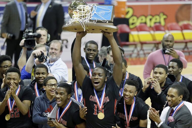 Constitution begins the celebration with the trophy after the victory over Our Lady of Sacred Heart. .