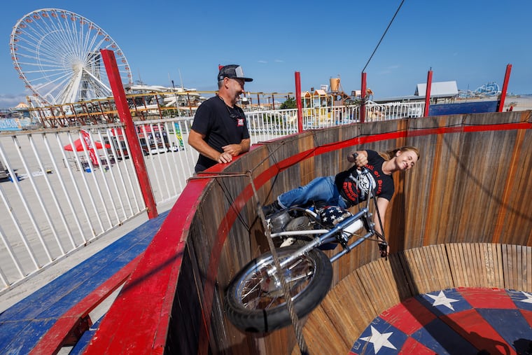 Ron Wolffe of Iowa watches acrobatic rider Ariell Flight on the Wall of Death.
