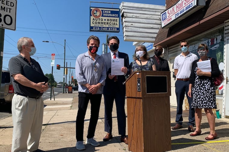 State Rep. Jared Solomon (D., Phila) holds a signed agreement between the nonprofit Philadelphia Interfaith Hospitality Network and Hapco Philadelphia, a landlords association. Also at the signing (from left) Jim Sims, Hapco Philadelphia member; Greg Wertman, Hapco Philadelphia president; Solomon; Rachel Falkove; Aliya T. Vance, case manager at PIHN; Bob Byrne, director of operations at PIHN; and Anita Lyndaker-Studer, Northeast coordinator at PIHN.)