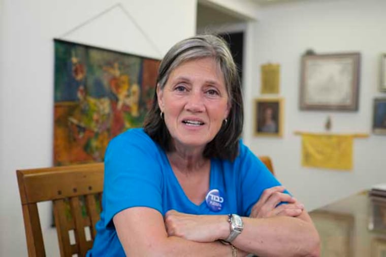 Wednesday June 4, 2014, Lisa Richman, president of the Perelman Jewish Day School, sits in her kitchen and talks about her union and her school. Administrators at the school have told the teachers they wouldn't recognize their union. (ED HILLE / Staff Photographer )