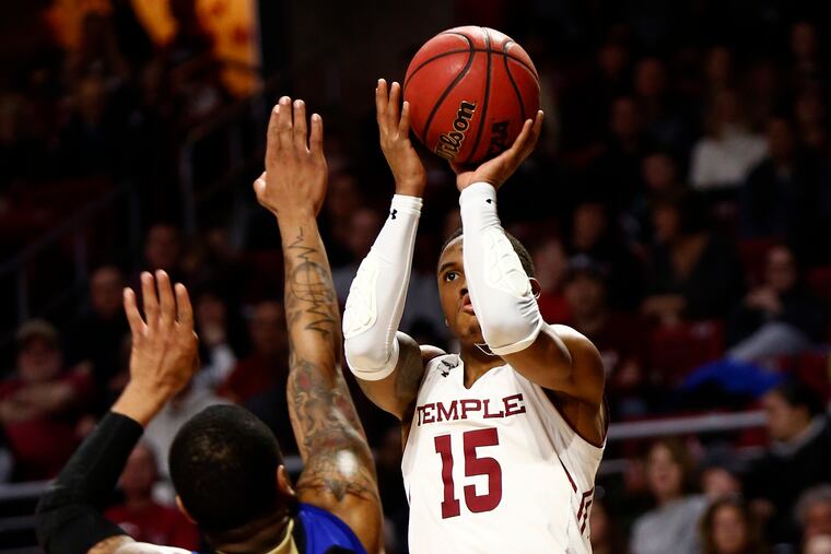 Temple guard Nate Pierre-Louis shoots over Tulsa guard Elijah Joiner during the second half.