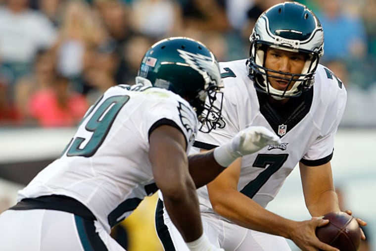 Sam Bradford hands the football to DeMarco Murrary.