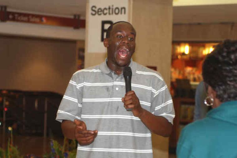 At Suburban Station, Anthony Riley performs Motown hits. New SEPTA rules for entertainers there and at Market East mean limited sites, performance times, and sound levels. The agency is addressing riders and merchant complaints.