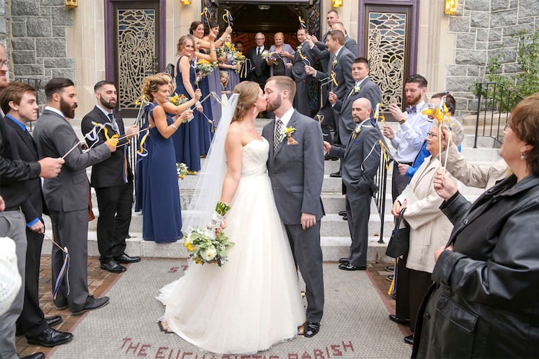 Newlyweds Holly Deininger and Robert Curcio with family and friends at St. Peter's.