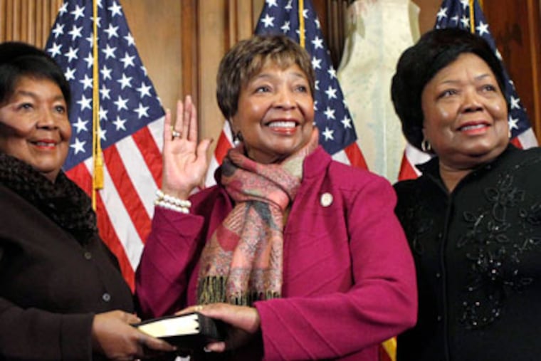 FILE - In this Jan. 5, 2011 file photo, House Speaker John Boehner of Ohio participates in a ceremonial swearing in with Rep. Eddie Bernice Johnson, D-Texas, second from right, on Capitol Hill in Washington. For two decades, Eddie Bernice Johnson has been an outspoken voice for Democrats in a bright blazer and multicolored scarf. But for the first time, the first black woman to represent North Texas in Congress is facing serious opposition in this month's primary. And the effort to unseat her is just one of several challenges being mounted against some of the longest-serving blacks in Congress. (AP Photo/Jacquelyn Martin, File)